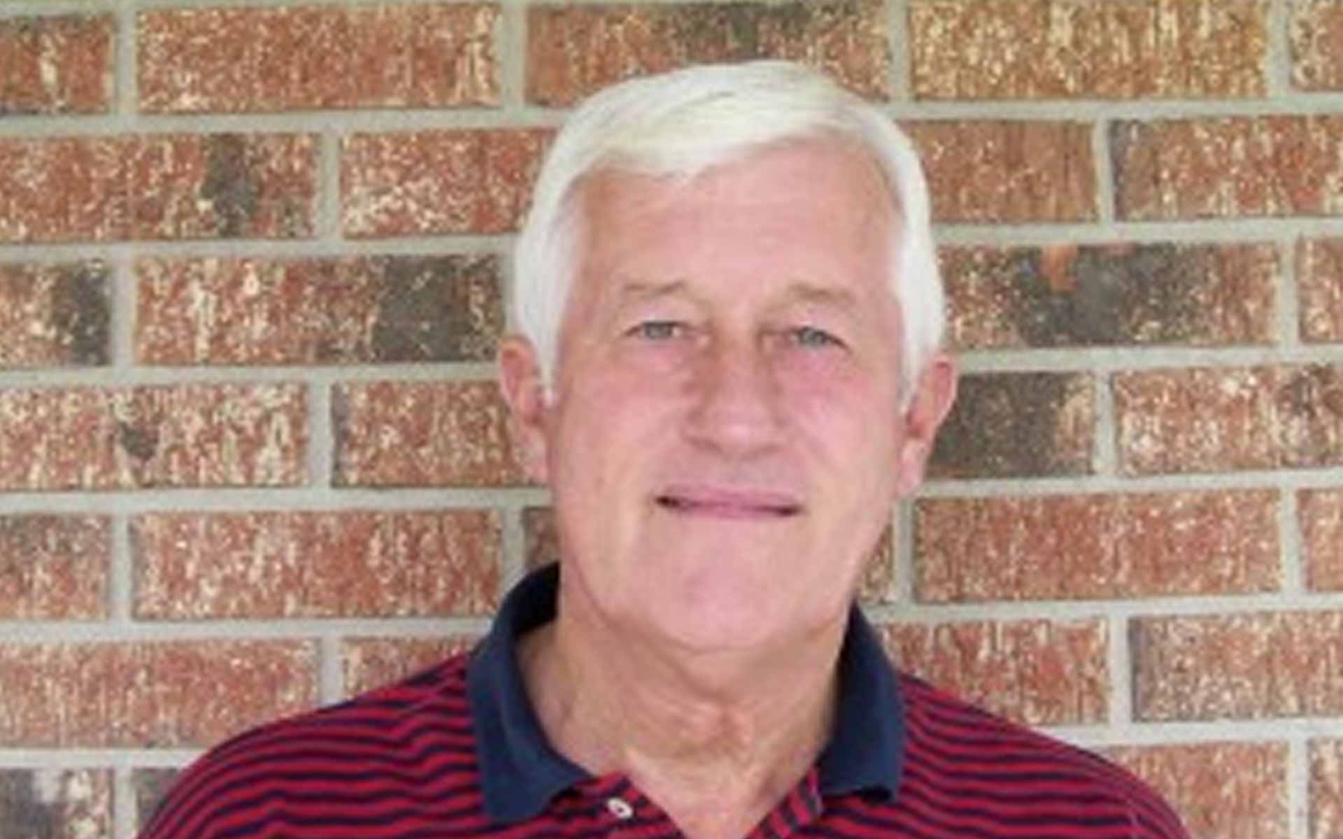 franklin county board chairman larry miller standing in front of a brick wall